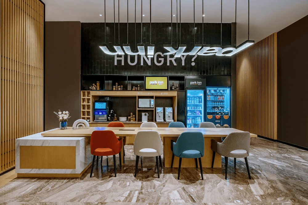 NEO CUCINA ramen cooker in hotel lounge providing 24/7 hot meals