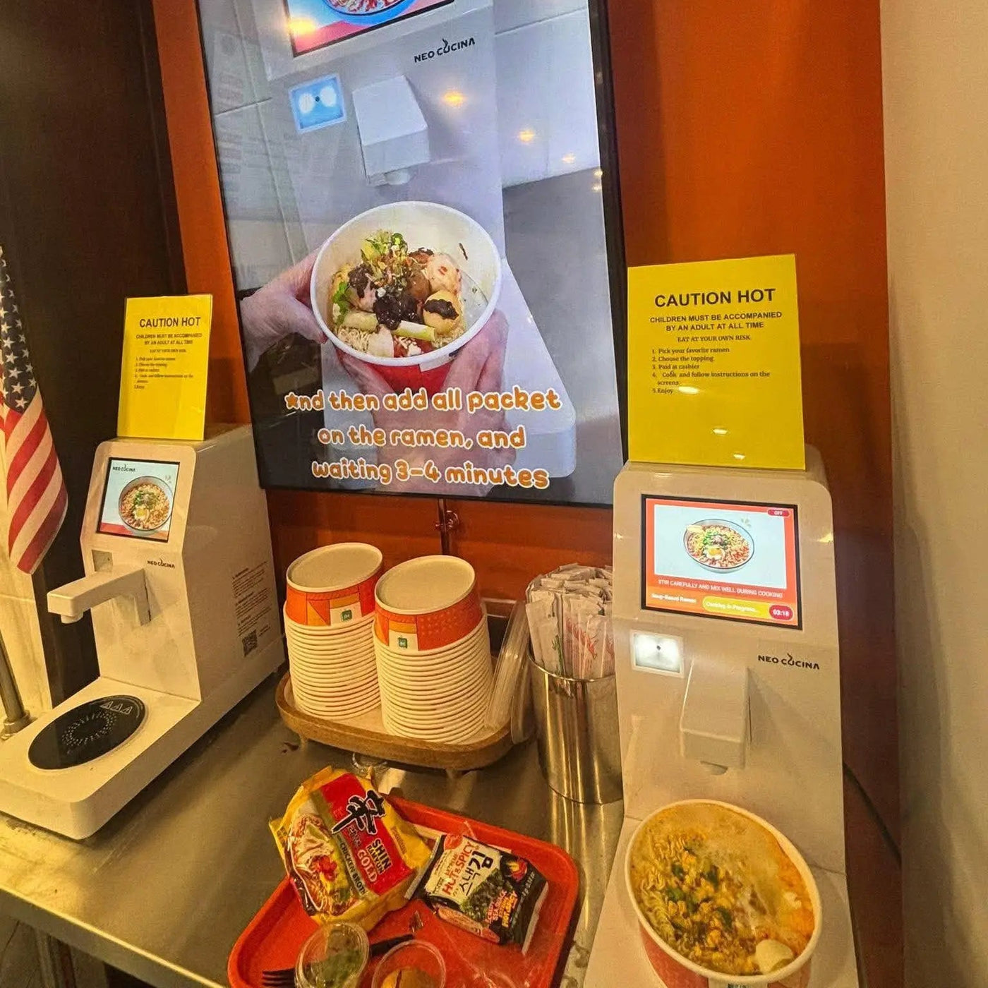 NEO CUCINA self-serve ramen station installed inside a banh mi shop with touchscreen ramen cookers and ramen display