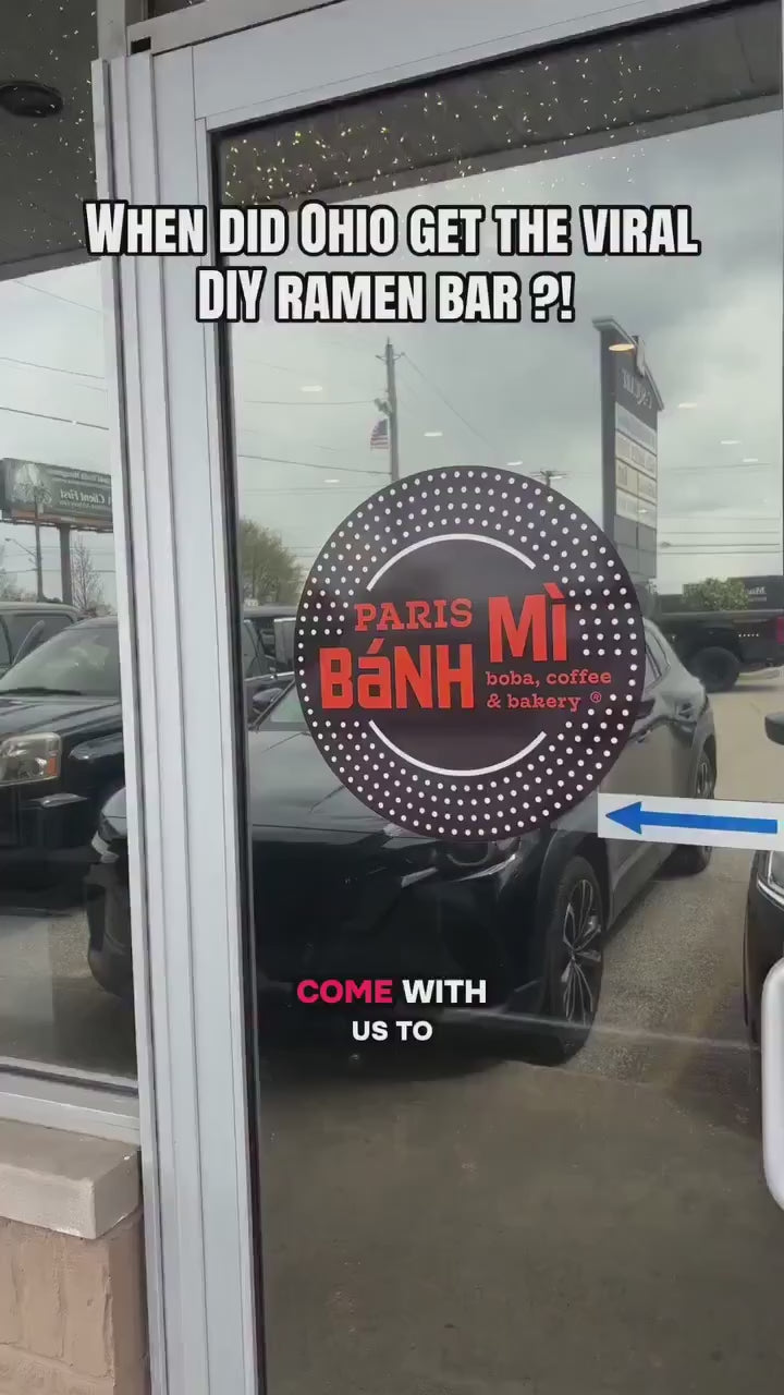 A family cooking ramen at a DIY ramen bar inside a Boardman, Ohio bakery