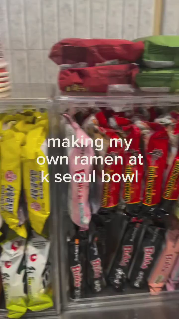 Customer scanning and cooking Shin Ramyun at a Korean restaurant in Visalia, California