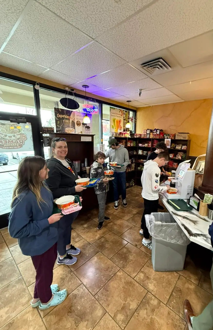 self-serve ramen station inside a boba shop as a food add-on for customers