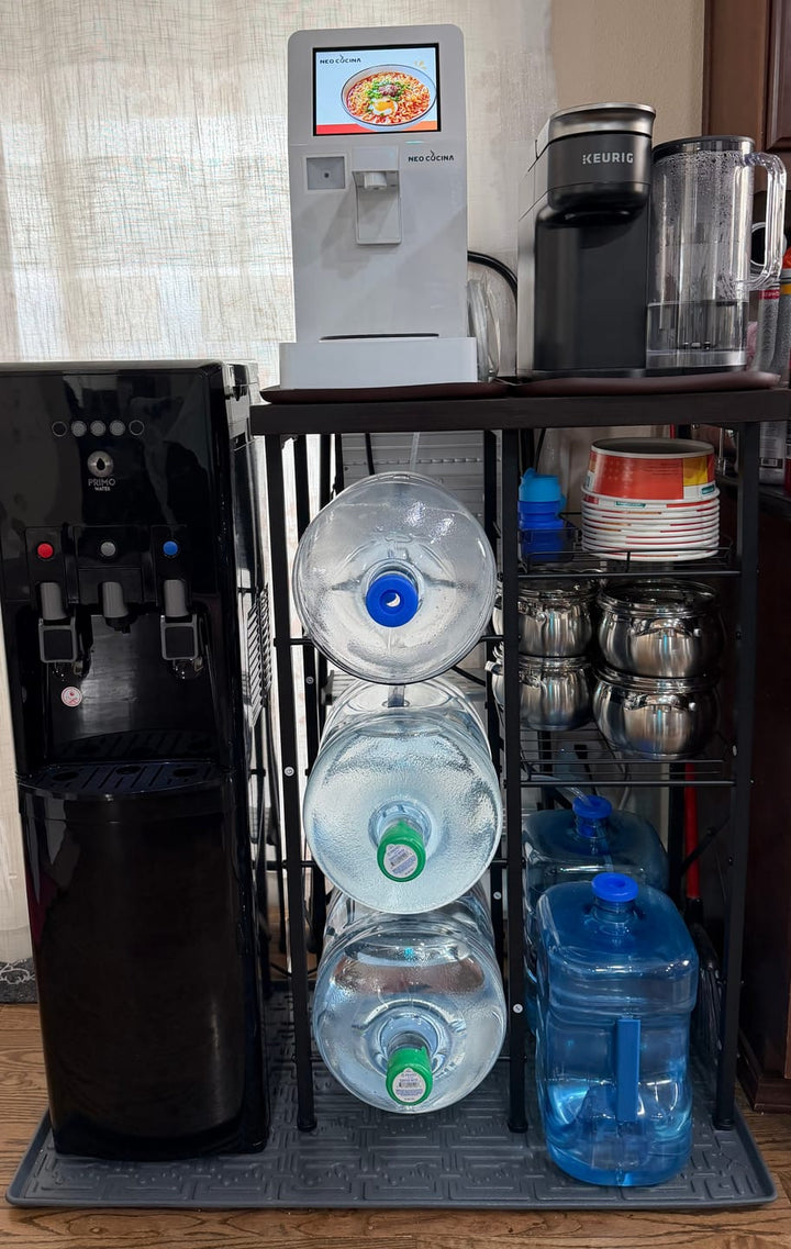 A NEO CUCINA machine next to the coffee maker in an office break room in Colorado Springs