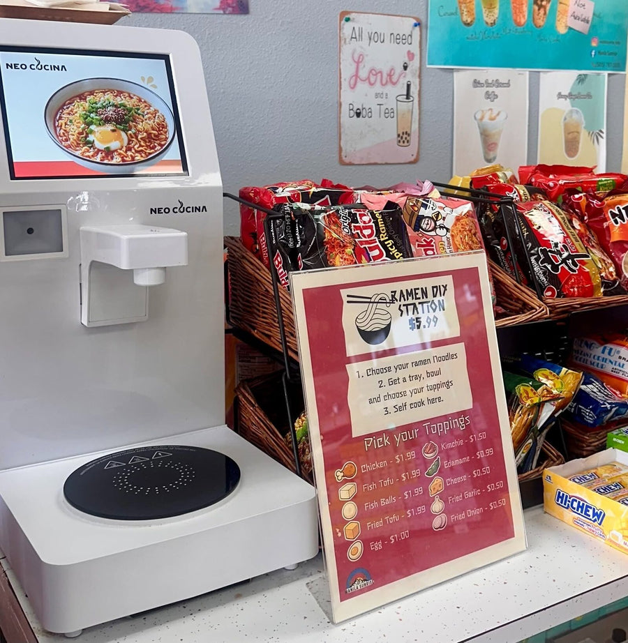 NEO CUCINA Pro next to a $5.99 Ramen DIY Station sign and noodle baskets at an Asian market in Farmington, New Mexico